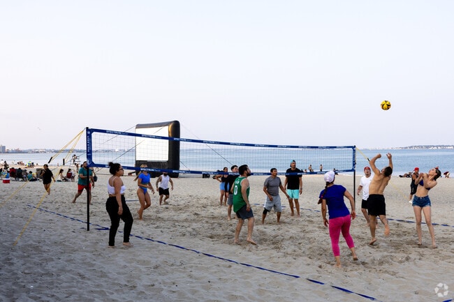 Play some volleyball before the movie starts on the beach at Theatre Thursday in Revere Beach.
