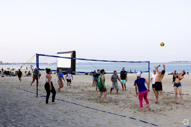 Play some volleyball before the movie starts on the beach at Theatre Thursday in Revere Beach.