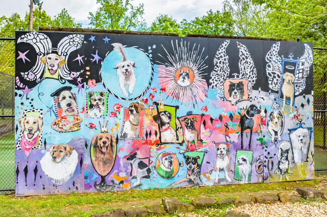 You'll find a colorful mural of dogs at the Peachtree Hills Park.
