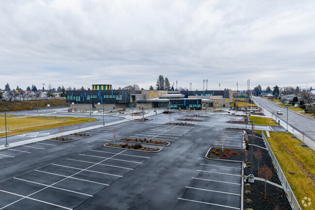 Glover Middle School features a large parking lot beside the school.