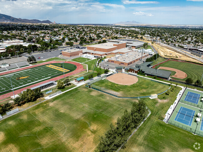 Kearns High School’s well kept sports fields have views of the Oquirrh Mountains.