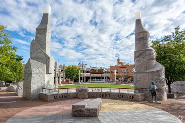 Main Street Square hosts events and splash‑pad fun downtown.