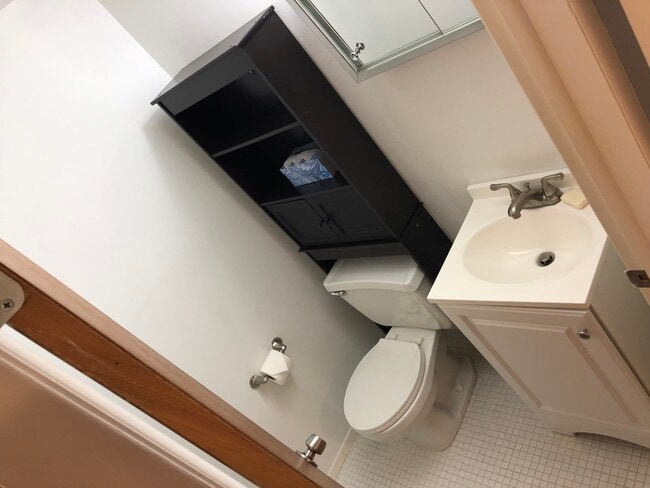 Downstairs bathroom with toilet and sink