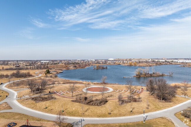 Gallery Park features a fish stocked lake with paths along the perimeter.