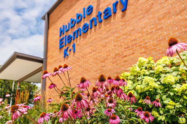 Manicured flower beds add to the beauty of the Hubble Elementary School.