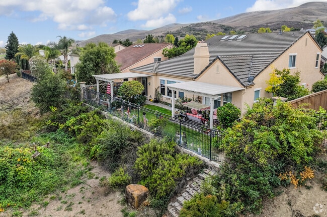 In Hiddenbrooke it's common to find homes kept private with lush foliage.