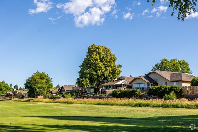 Homes line the picturesque Longmont Twin Peaks Golf Course in Longmont Estates.