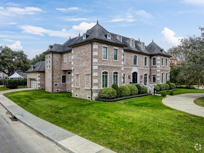 Bellaire's French-inspired homes evoke elegance along tree-lined streets.