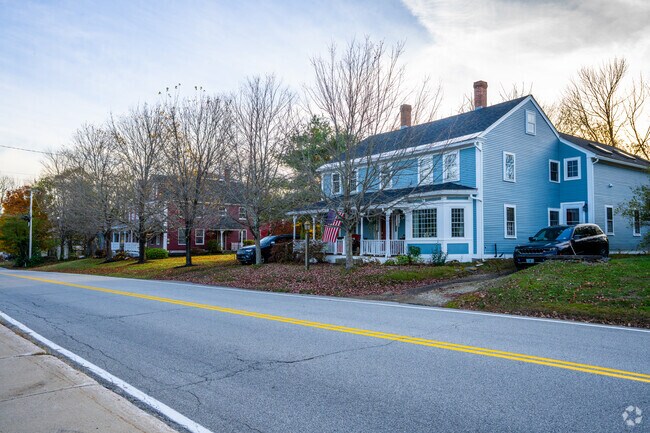 Charming Colonial-style homes along Main Street in Rindge, showcasing classic New England architecture.