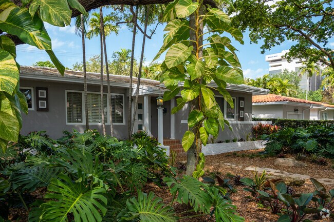 Ranch-style homes in Downtown Gables offer single-level living with timeless design and lush surroundings.