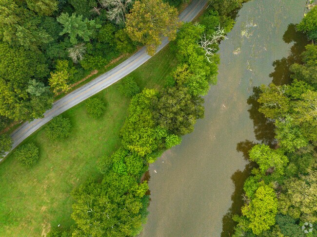 There are green walking trails along the river in Lancaster County Central Park in Stevens, PA.