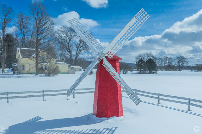 The red wind mills are a staple landmark for Clymer as there are a couple around town that welcome those driving by.