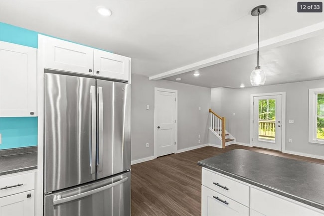 You can be in the kitchen but not miss any action happening in the living room, 'cuz open floor plan