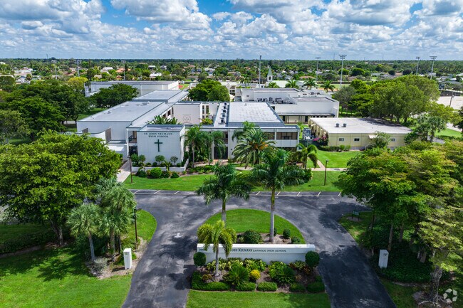 St. John Neumann High School has a large campus with a church and sports facilities.