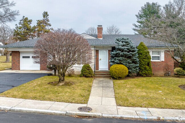 Ranch and red brick house can be found on Herbert Street in Manton.