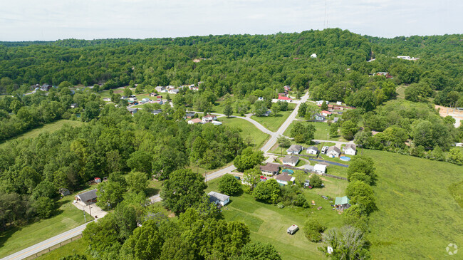 Farmland and woods surrounds the neighborhood of Brooks.