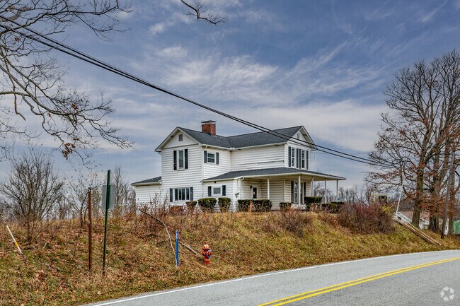 A renovation-ready 1880s farmhouse in Jefferson Township lists around $80,000 on 1.5 acres.