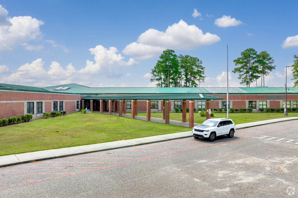 E. Melvin Honeycutt Elementary School in Jack Britt/Porter Place has large play areas.