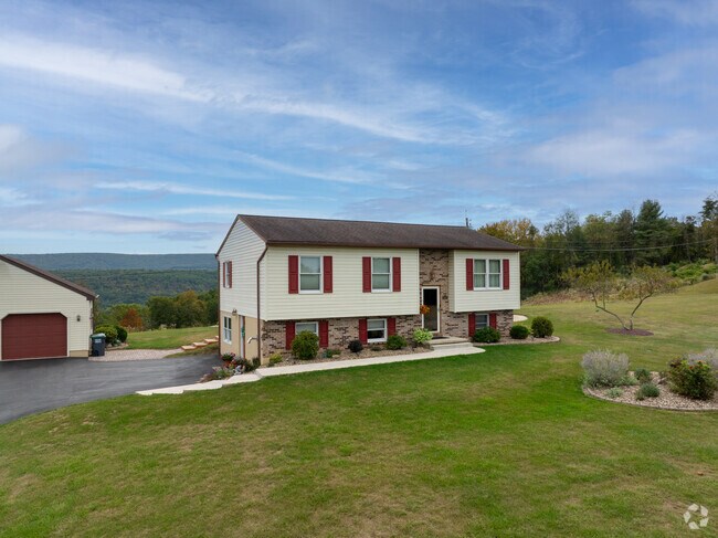Split-level homes in South Manheim sit on wide lots with open views of the surrounding hills.