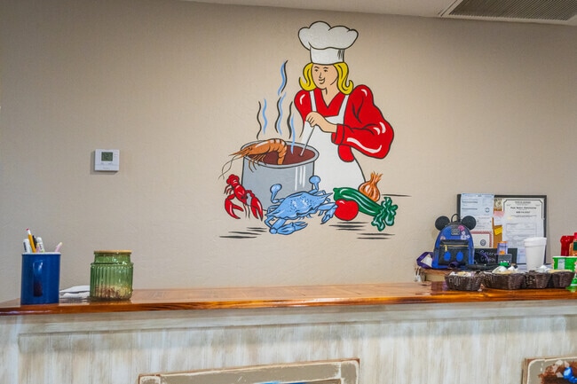 You'll be greeted by this colorful mural as you find your seat inside Me-Maw's Cajun Cuisine in Galliano.