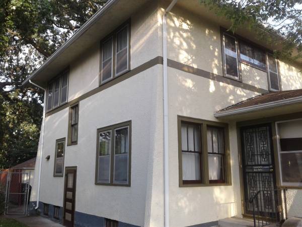 Exterior photo, that is a bit out of date. Property has all original windows, plus new storms.