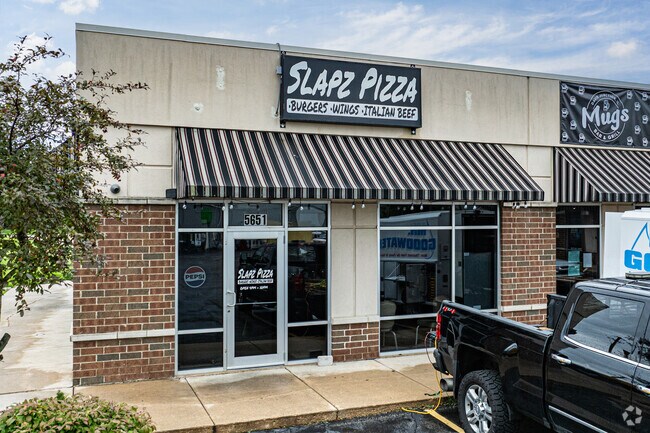 Quick pizza nights often start at Slapz Pizza in Davis Junction.