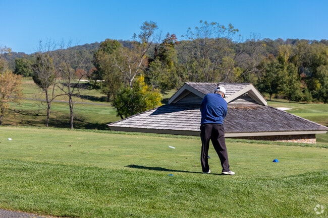 Chestnut Hill residents can play the 18-hole golf course at Riverview Country Club.
