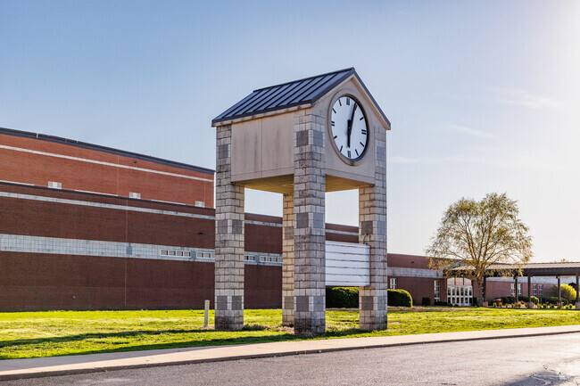 The Carl Junction High School has a distinctive clock tower near the main entrance.