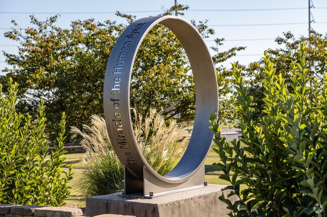 The Miracle of the Human Spirit statue at Cunningham Park is an important focal point.
