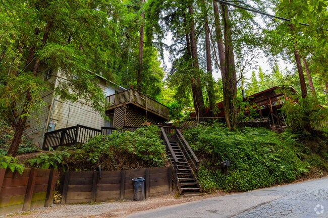 Many homes in Lompico feature decks to enjoy the towering redwoods.