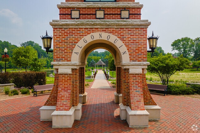 The iconic Cornish Park entrance welcomes visitors to the riverside park in Algonquin, IL.
