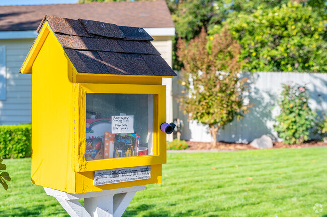 The neighborhood little library provides reading material in Merrihill.