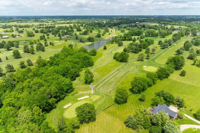 The Woodford Club is an 18-hole, par 71 golf course that spans 150 acres of rolling hills.