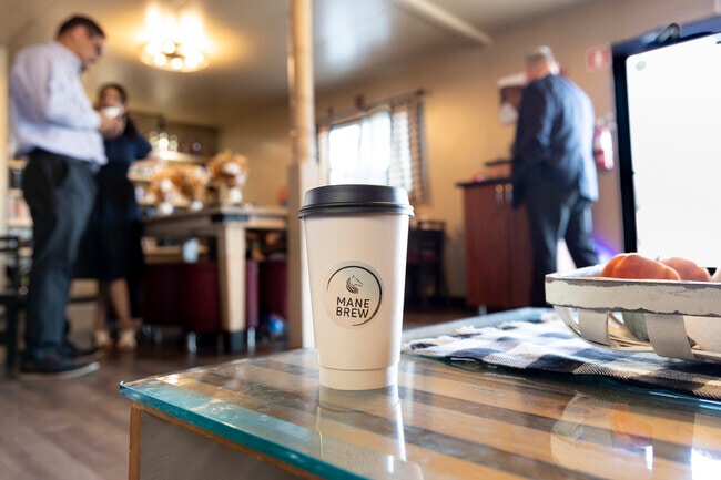 Start your day with a hot cup always served fresh at Mane Brew Coffee in Salt Creek Pueblo.