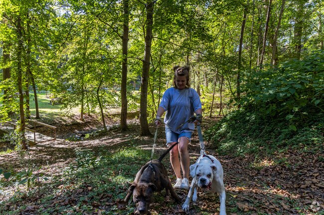 Spend time with your best friend in Laurel Hollow Park.
