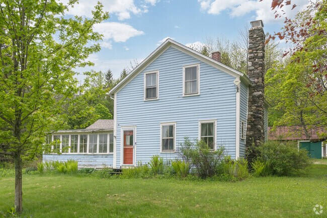 A traditional American farmhouse style home is typical of Savoy.