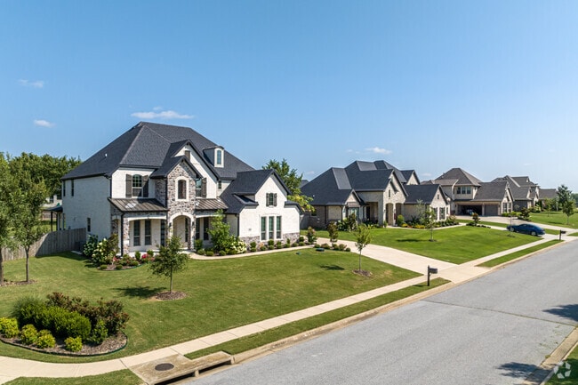 Cave Springs offers spacious lawns and quiet streets.