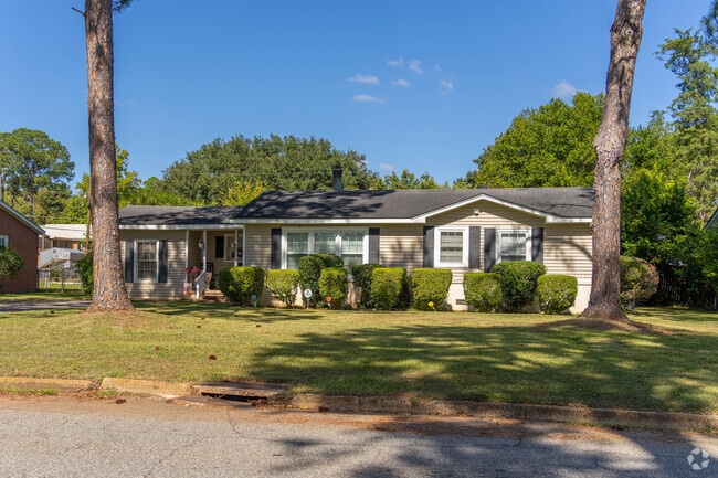 Quaint home surrounded by tall trees can be found all around Sherwood.