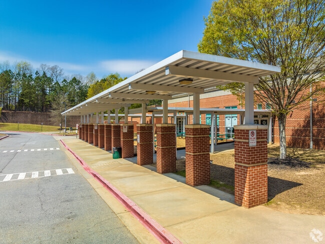 Bus drop off and pick up area of Cogburn Woods Elementary School.