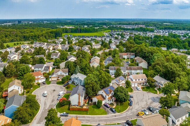 Lush lawns surround Burtonsville homes, curling around cul-de-sacs in planned neighborhoods.
