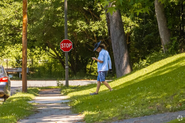 The mailmen still walk door to door in the West Boulevard neighborhood.