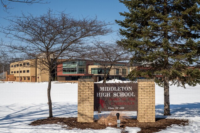 Middleton High School's Signage shows the school in the background.