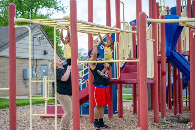 Williams-Woodland Park families head to Packard Park to play.