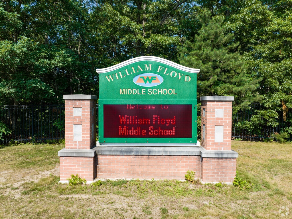 Welcome to William Floyd Middle School shows an electronic billboard for news in Moriches.