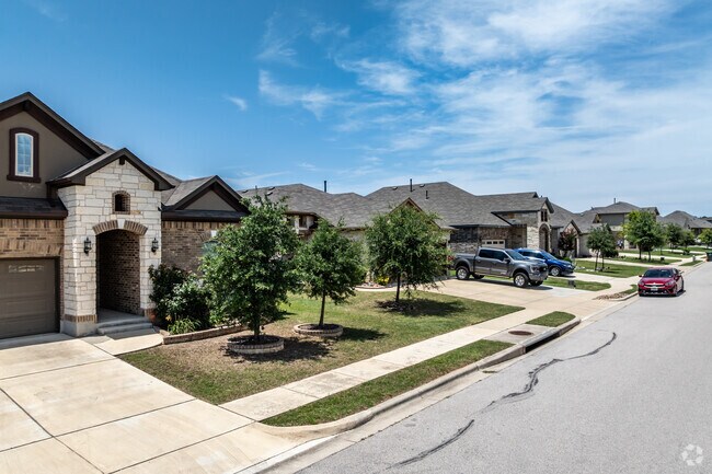 This row of new traditional style homes is a common site in Blanco River District.