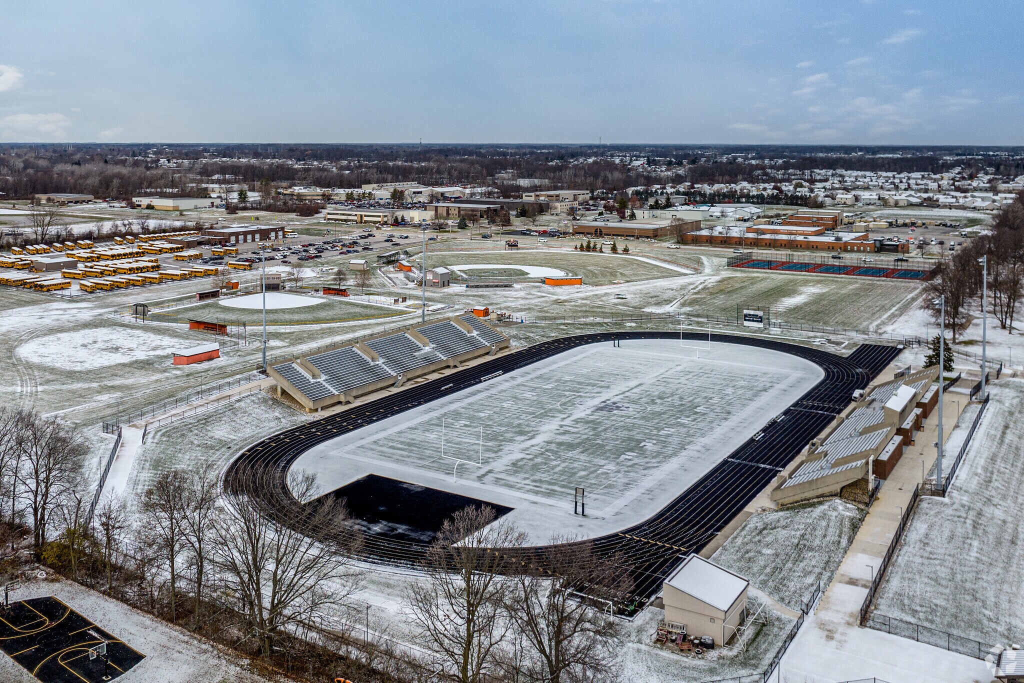 The stadium at Northrop High School is a Friday night game day gathering place.