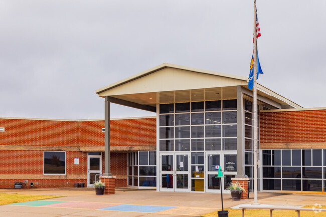 The main entrance of Deer Creek Elementary School is a modern design.