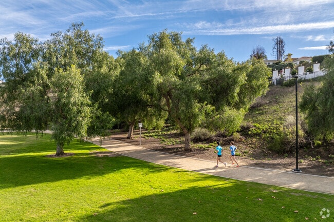 Locals enjoy a refreshing jog on the trails at Arroyo Vista Community Park.