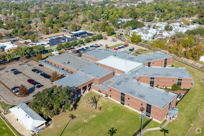 Green surroundings frame Spring Branch Elementary's exterior, an oasis for education.