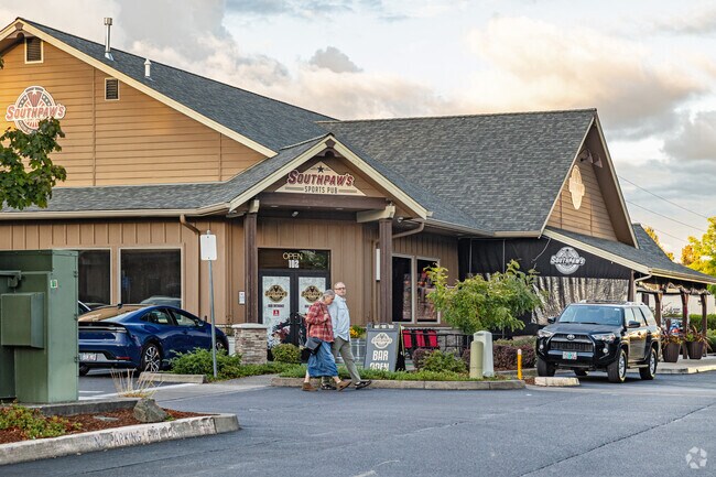 Southpaw's Sports Pub in North Albany, OR has TV screens to watch the games and a pizza menu.